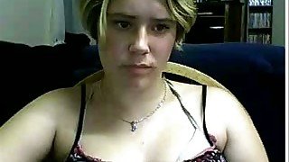 Boring German blondie demonstrates her boob with poker face