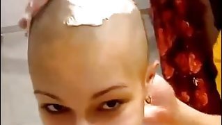 girl friend shaves her had all the way bald