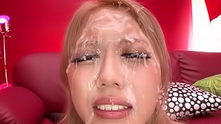 A cum hungry Japanese babe opens up wide during a facial