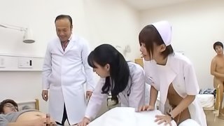 A pair of nurses take turns opening their legs & lips