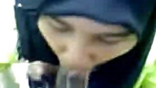 Hijabi sucking and drinking cum