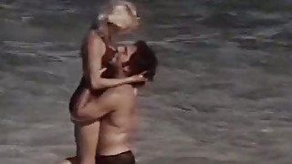 Ginger Lynn Allen is having passionate sex on a beach with a hairy dude