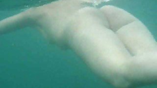 My beautiful wife swims underwater and her butt muscles work