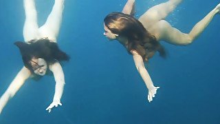 Slender and hot white bitches underwater in the sea