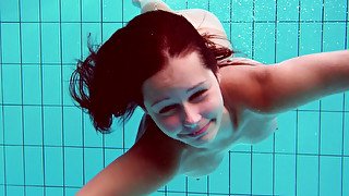 Sexy teen European brunette all naked underwater on cam