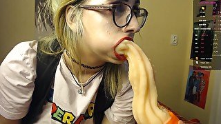 Busty blonde sucking weird anal toys on webcam