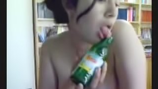 Babe bangs pussy with a bottle