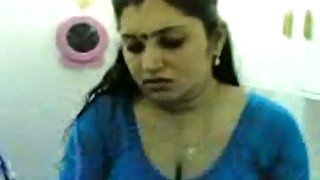 Cute and chubby Indian wifey teased on the bed in front of cam