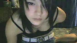 Sexy emo teen chick flashing her boobies on the webcam for the first time