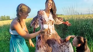 Girls cover the pretty bride in dirty mud and strip her