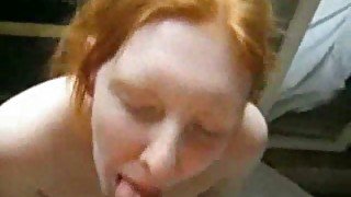 Ginger haired Irish coed gives blowjob and takes facial