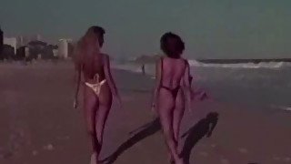 Two big booty girls get tanned on the beach before getting eaten