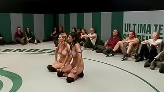 Two lusty babes are torturing one sexy wrestler