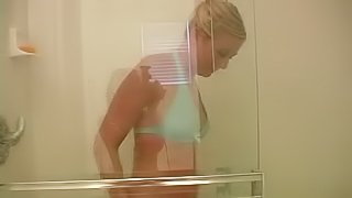 Homemade clip with amateur blondie taking a shower
