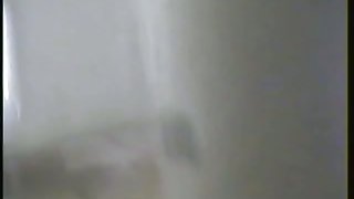 Toilet voyeur video of a hot slim blonde pissing