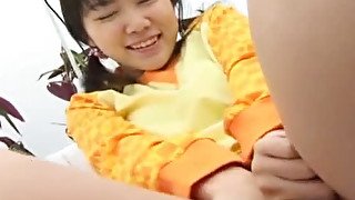 Hot babe Ayu Mayumi is masturbating with her hands and having a good time