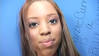 Ebony with tattoo gets facial cumshot after giving nasty blowjob in gloryhole