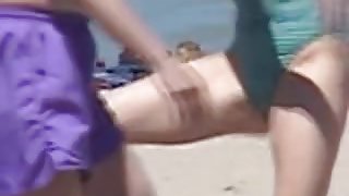 Pretty doll in candid bikini bends over before the camera 01zo