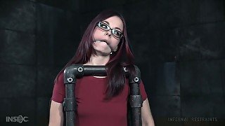 Nerdy redhead Ivy Addams takes a chance in BDSM workout