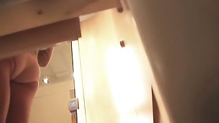 Hidden cam girl in changing room sexy booty and tits