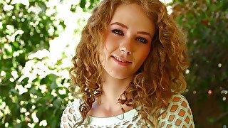 Curly-haired babe Kimber Day gives her boyfriend one hell of a blowjob