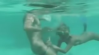 Adorable blonde girl getting fucked in the ocean