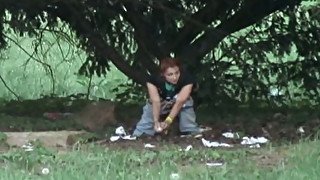 Stranger white redhead chick under the tree pulls down jeans and pisses