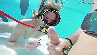 Babe having sex underwater and loving every second of it