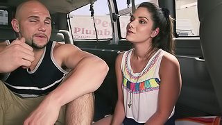 Horny brunette chick enjoys doggy style sex in a car