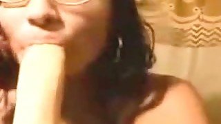 Nerdy masturbates and gives blowjob to one lucky dildo