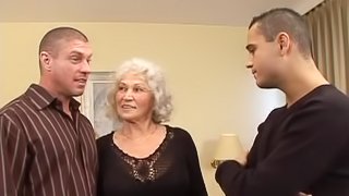 Two Hot Sexy Dudes Fuck A Horny Grannma On The Bed