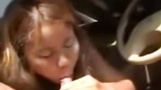 Dude tapes a streetslut servicing 2 of his friends in a car