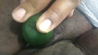 This mature BBW is not scared to fuck her pussy with a cucumber on camera