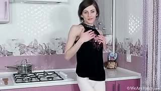 Olivia Arden masturbates in her kitchen