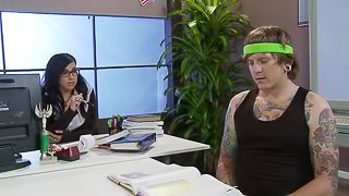 A sexy tatted up teacher fucks a student in her office