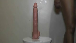 Ebony girl takes huge dildo in her pussy
