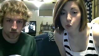 Curly haired webcam dude lets his GF show off her tits and ass