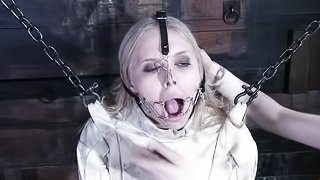 Blonde girl in straightjacket gets tied up and toyed