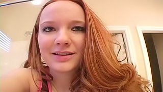 Redhead skank Halo rubs her cunt and asshole with a dildo