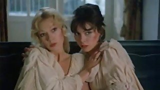 Brigitte Lahaie performs a classic lesbian scene in cozy bed