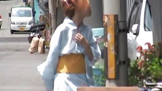 Redhead in traditional clothes got boob sharked on a street