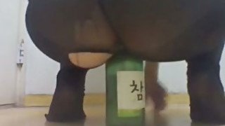 I am horny Korean whore and I love to stuff my pussy with a beer bottle