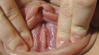 My horny wife is extremely proud of her swollen pussy