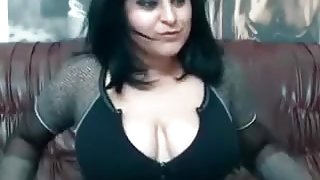 Raven haired girl with huge melons loves playing with her dildos