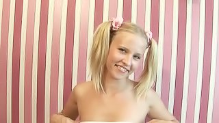 Curvy pigtails teen with small tits masturbating passionately indoors