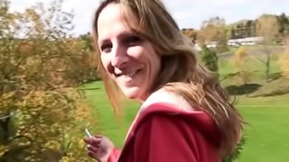 Brown-haired milf sucks a cock greedily outdoors in POV clip