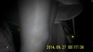 Shiny black pantyhose in night vision