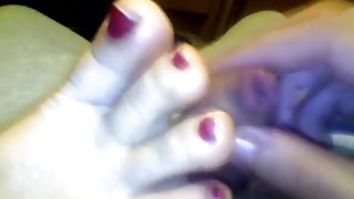 Pretty red toes wife footjob cumonfeet