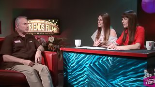 Pornstars host a talk show with a producer on as their guest