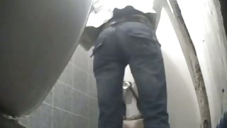 Toilet voyeur blonde with great ass bends over and takes a nice long piss